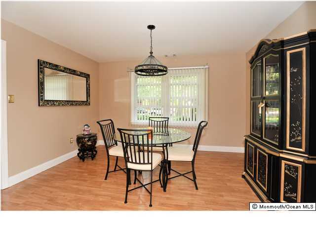 41 Eaglenest Road Freehold, NJ 07728 - Photo 6 of 16 a dining room with furniture window wooden floor
