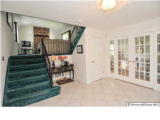 41 Eaglenest Road Freehold, NJ 07728 - Photo 9 of 16 a living room with furniture and a wooden floor