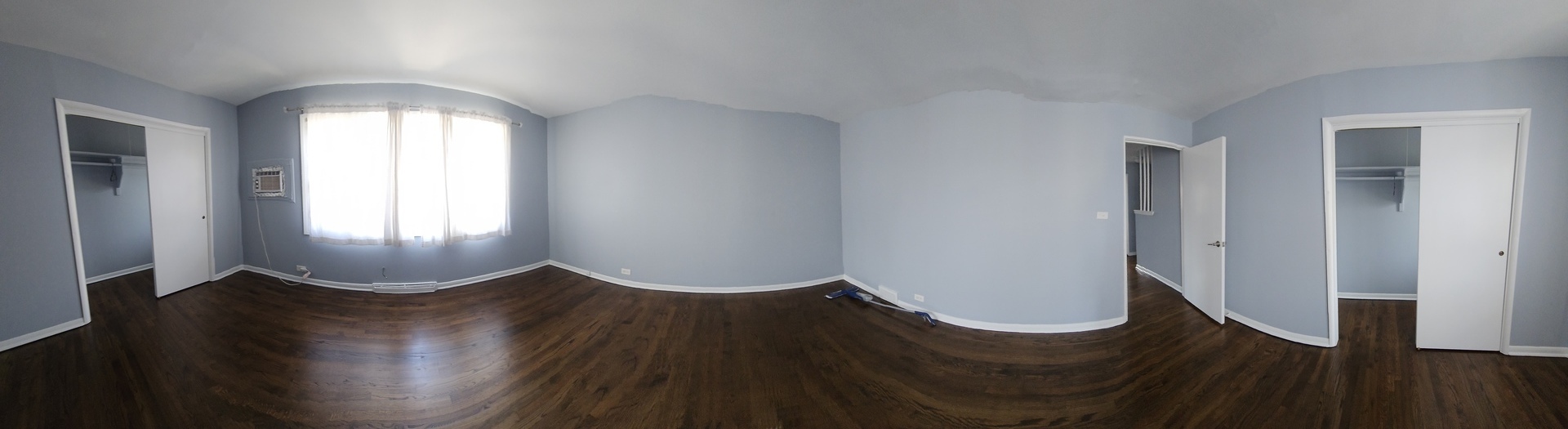 5115 North Springfield Avenue, Unit B Chicago, IL 60625 - Photo 6 of 11 wooden floor in a hall with an entryway