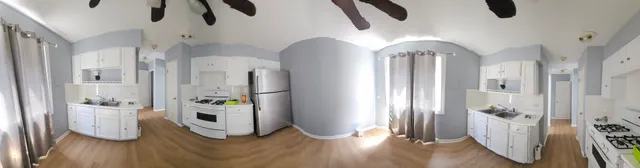 a bathroom with a toilet a sink and a window