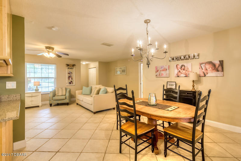 933 Mill Rd Lane Port Orange, FL 32127 - Photo 13 of 49 Dining Area