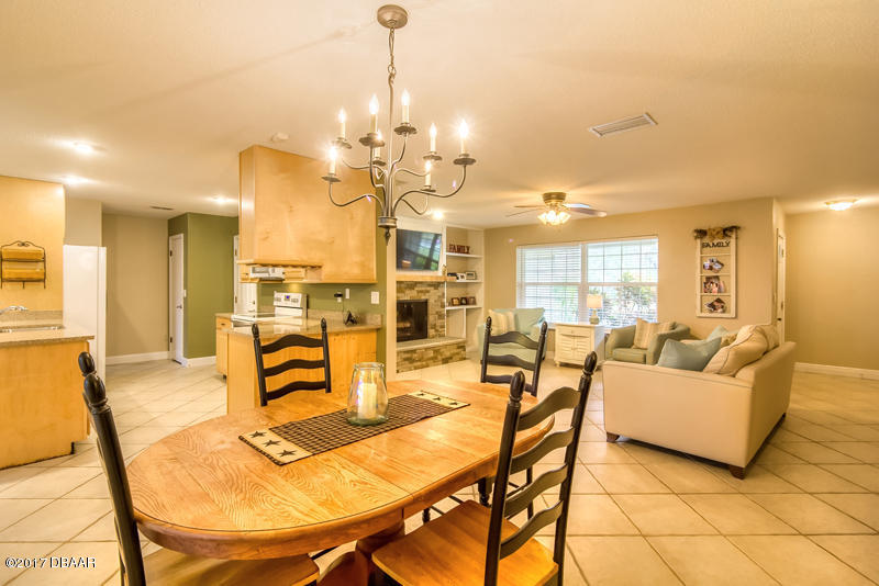 933 Mill Rd Lane Port Orange, FL 32127 - Photo 15 of 49 Dining & Family Room