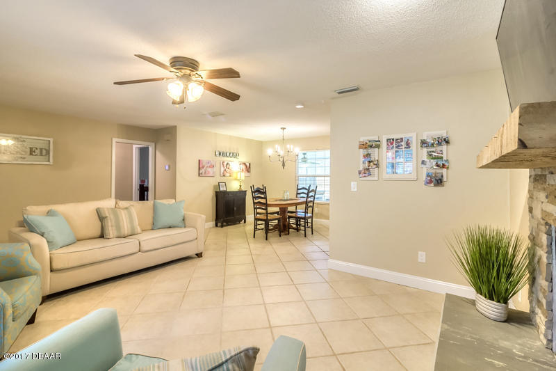 933 Mill Rd Lane Port Orange, FL 32127 - Photo 20 of 49 Family Room & Dining Area
