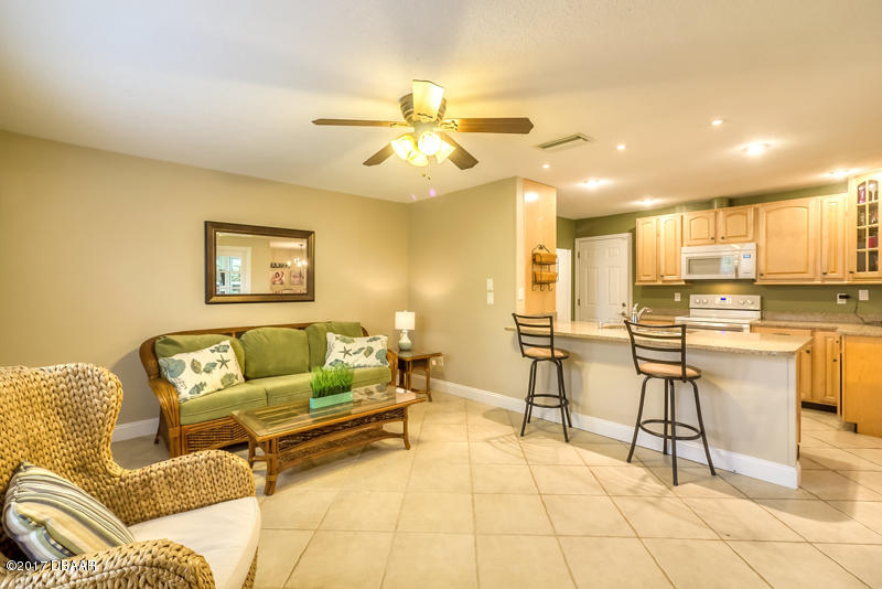 933 Mill Rd Lane Port Orange, FL 32127 - Photo 7 of 49 Living Room & Kitchen