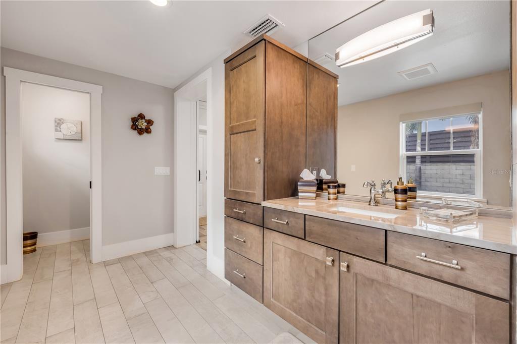 1 Mar Azul North Ponce Inlet, FL 32127 - Photo 15 of 76 a spacious bathroom with a double vanity sink a mirror and a shower
