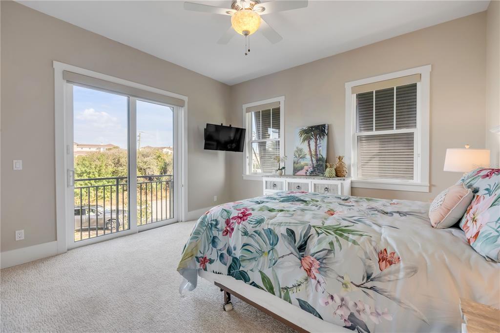 1 Mar Azul North Ponce Inlet, FL 32127 - Photo 36 of 76 a bedroom with a bed and a window