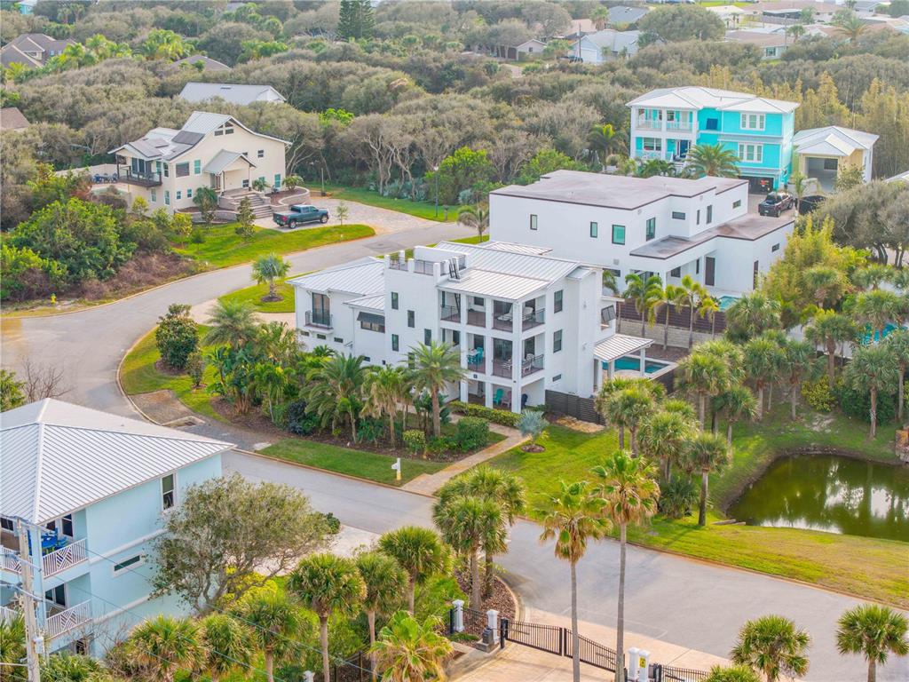 1 Mar Azul North Ponce Inlet, FL 32127 - Photo 4 of 76 an aerial view of residential houses with outdoor space and swimming pool