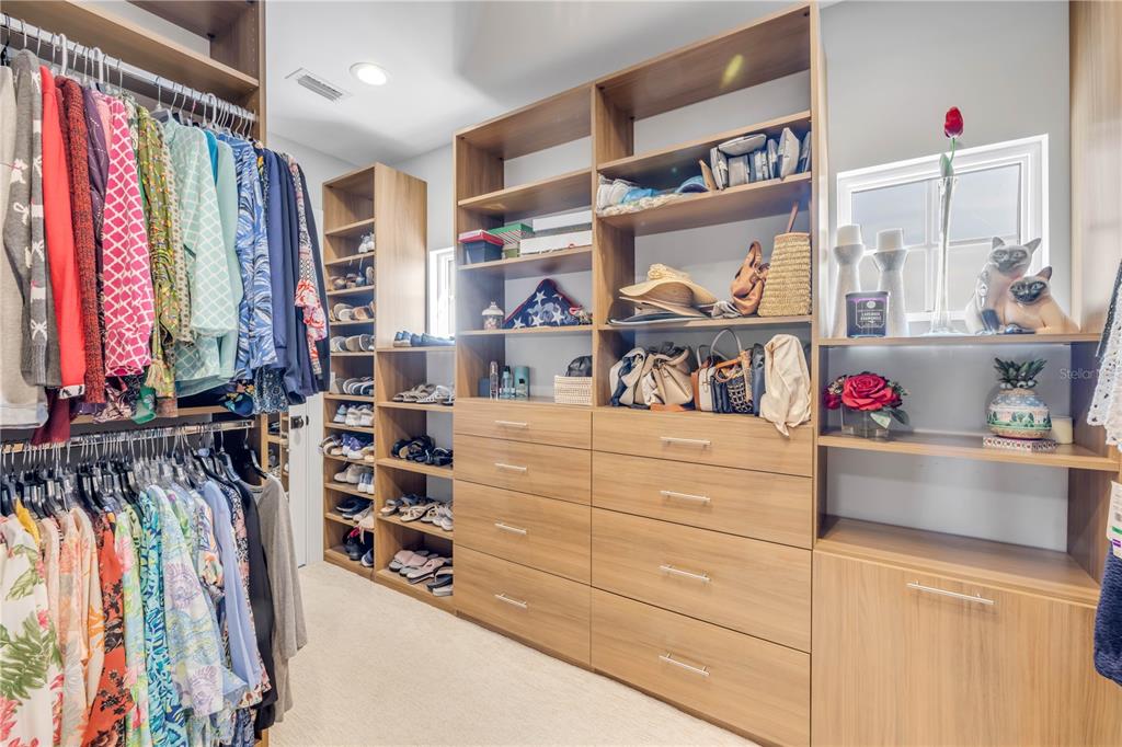 1 Mar Azul North Ponce Inlet, FL 32127 - Photo 53 of 76 a view of walk in closet with clothes and shoes