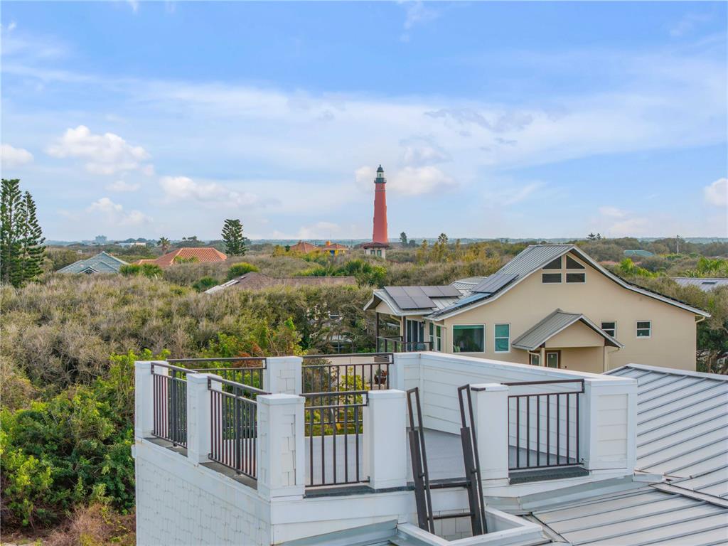 1 Mar Azul North Ponce Inlet, FL 32127 - Photo 58 of 76 a view of a city from a balcony