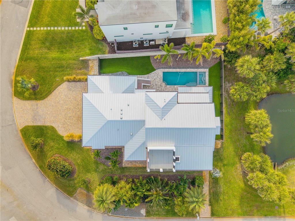 1 Mar Azul North Ponce Inlet, FL 32127 - Photo 70 of 76 an aerial view of a house with a swimming pool