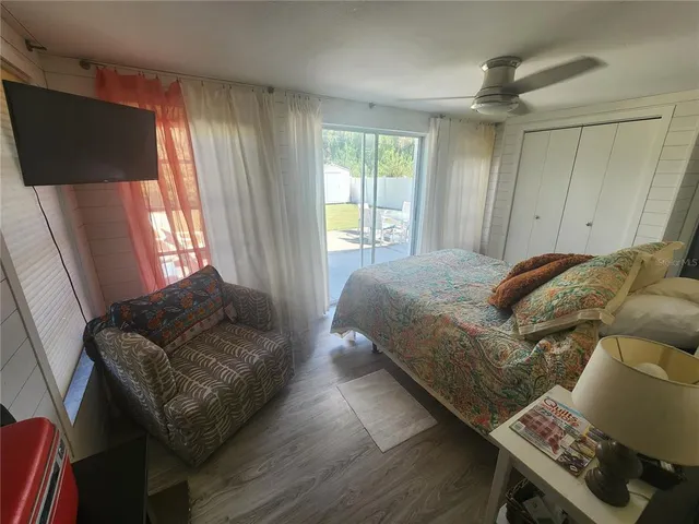 a living room with a couch and a flat screen tv