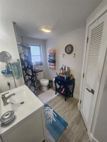 a bed room with furniture and a window