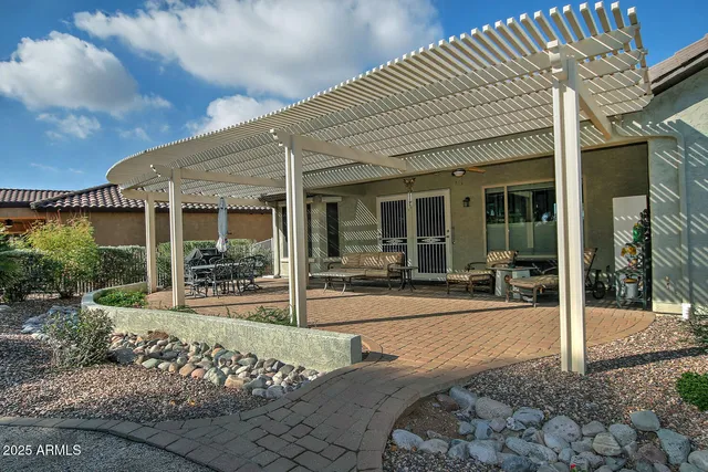 an aerial view of a house with a garden