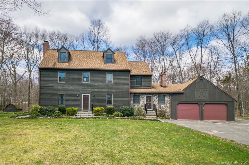 15 White Gate Road Oxford, CT 06478 - Photo 1 of 1 a front view of a house with garden