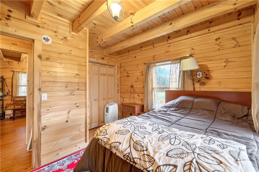64 Memorial Drive Perryopolis, PA 15473 - Photo 18 of 44 a bedroom with a bed and a dresser