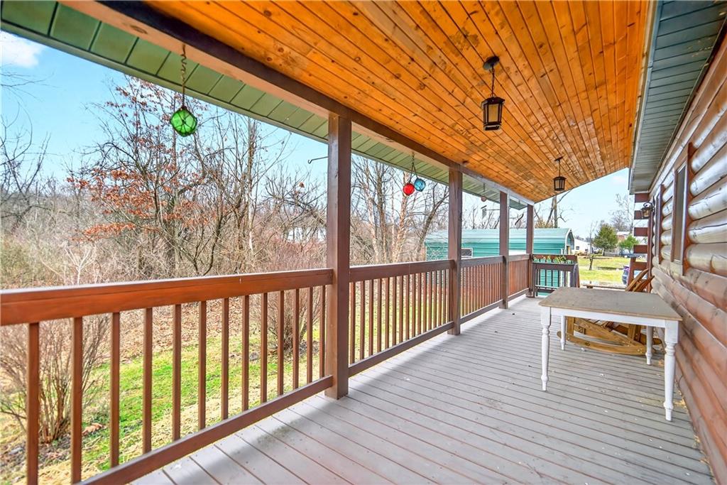 64 Memorial Drive Perryopolis, PA 15473 - Photo 32 of 44 a view of porch with seating space