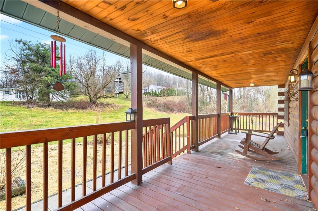 64 Memorial Drive Perryopolis, PA 15473 - Photo 34 of 44 a view of porch with wooden floor and outdoor space