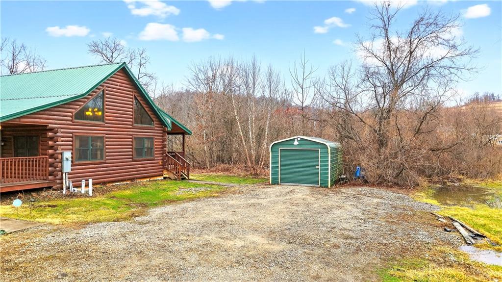 64 Memorial Drive Perryopolis, PA 15473 - Photo 38 of 44 a backyard of a house