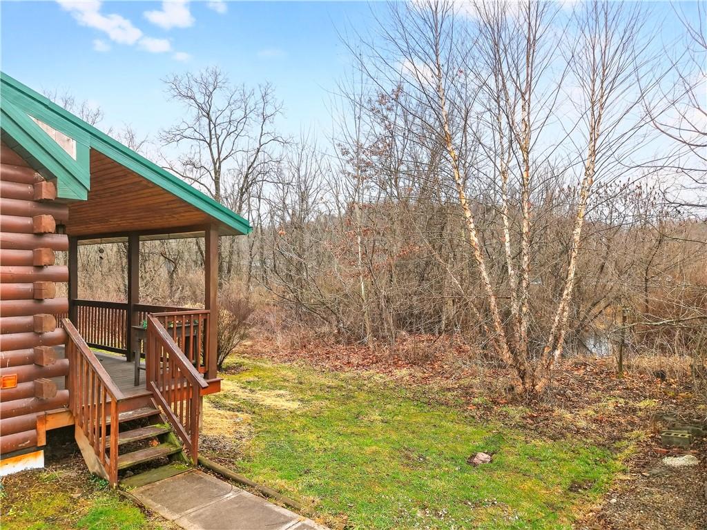 64 Memorial Drive Perryopolis, PA 15473 - Photo 39 of 44 a view of backyard with a patio