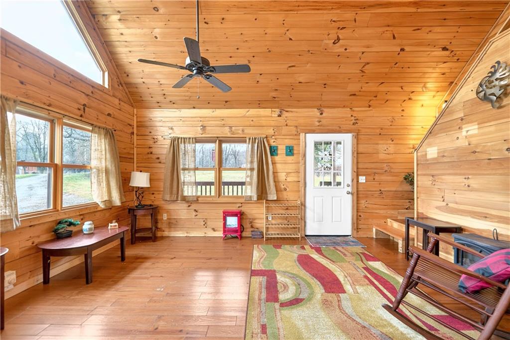 64 Memorial Drive Perryopolis, PA 15473 - Photo 6 of 44 a lobby with furniture and floor to ceiling window
