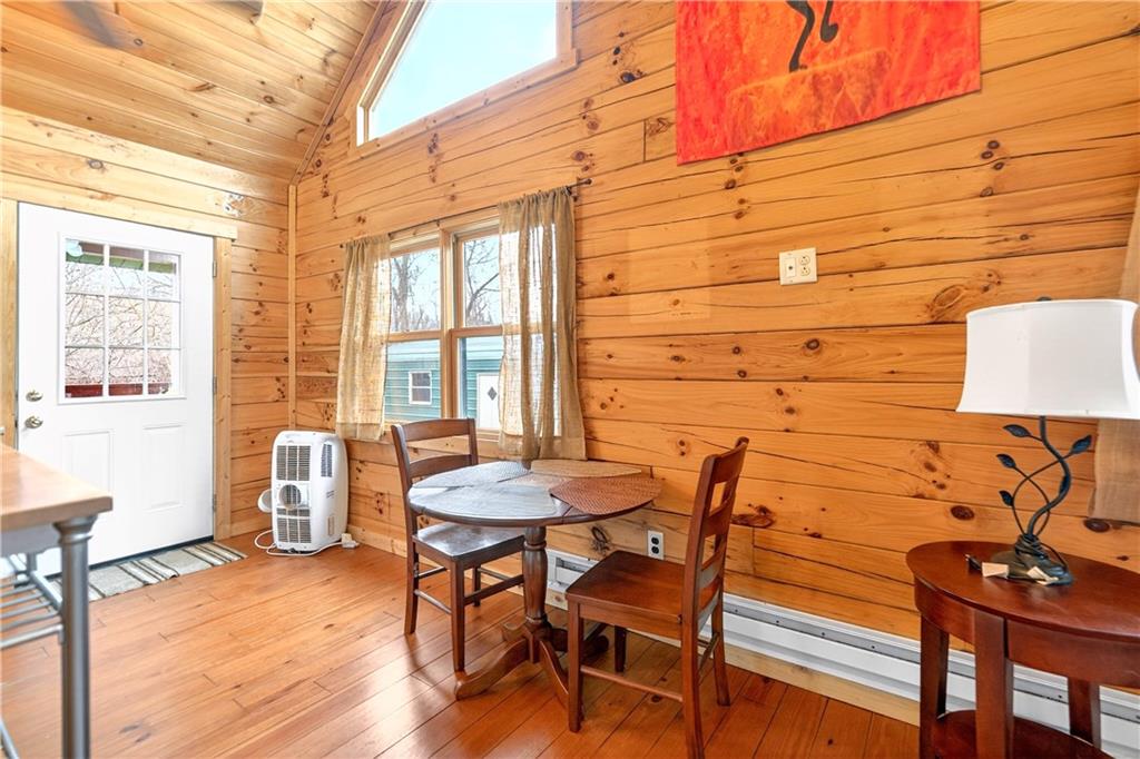 64 Memorial Drive Perryopolis, PA 15473 - Photo 7 of 44 a dining room with furniture and wooden floor