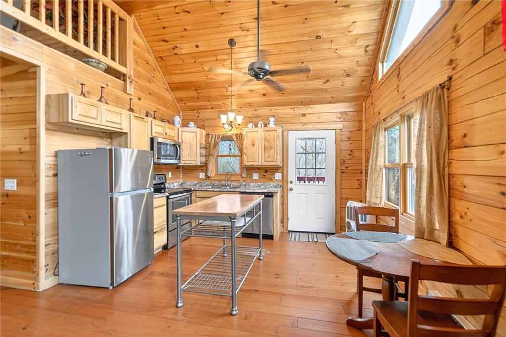 64 Memorial Drive Perryopolis, PA 15473 - Photo 8 of 44 a dining room with furniture and wooden floor
