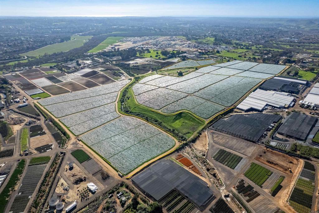 Wilshire Road Oceanside, CA 92057 - Photo 2 of 3 an aerial view of a house with a yard