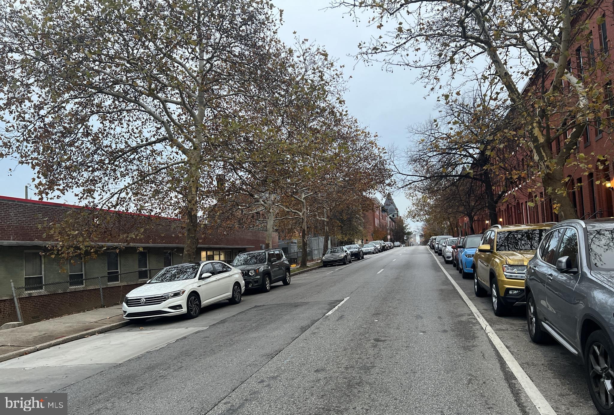 1606 McCulloh Street Baltimore, MD 21217 - Photo 10 of 10 Street lined with autumn trees.