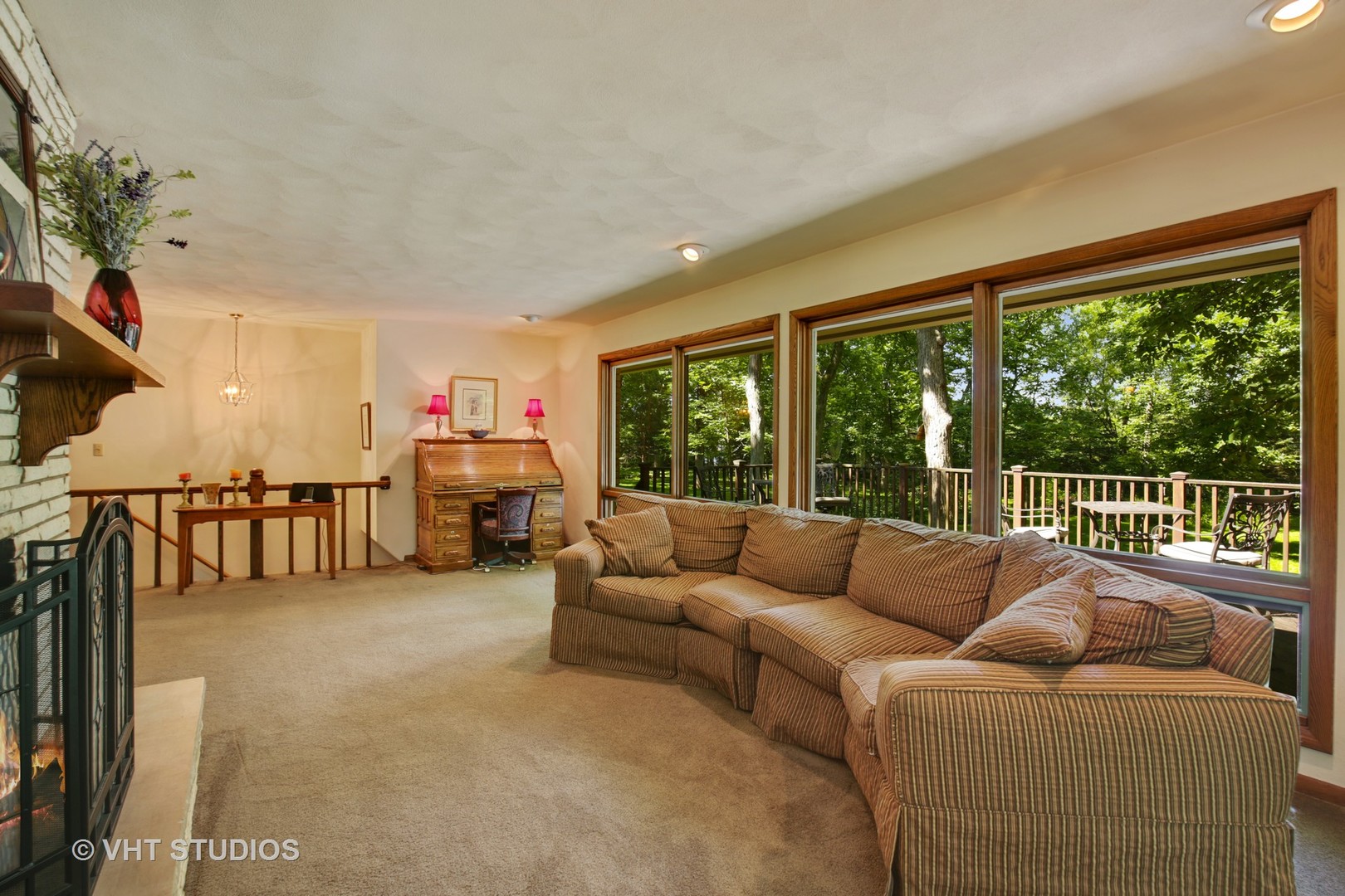 707 Hickory Road Woodstock, IL 60098 - Photo 6 of 16 a living room with furniture and a large window