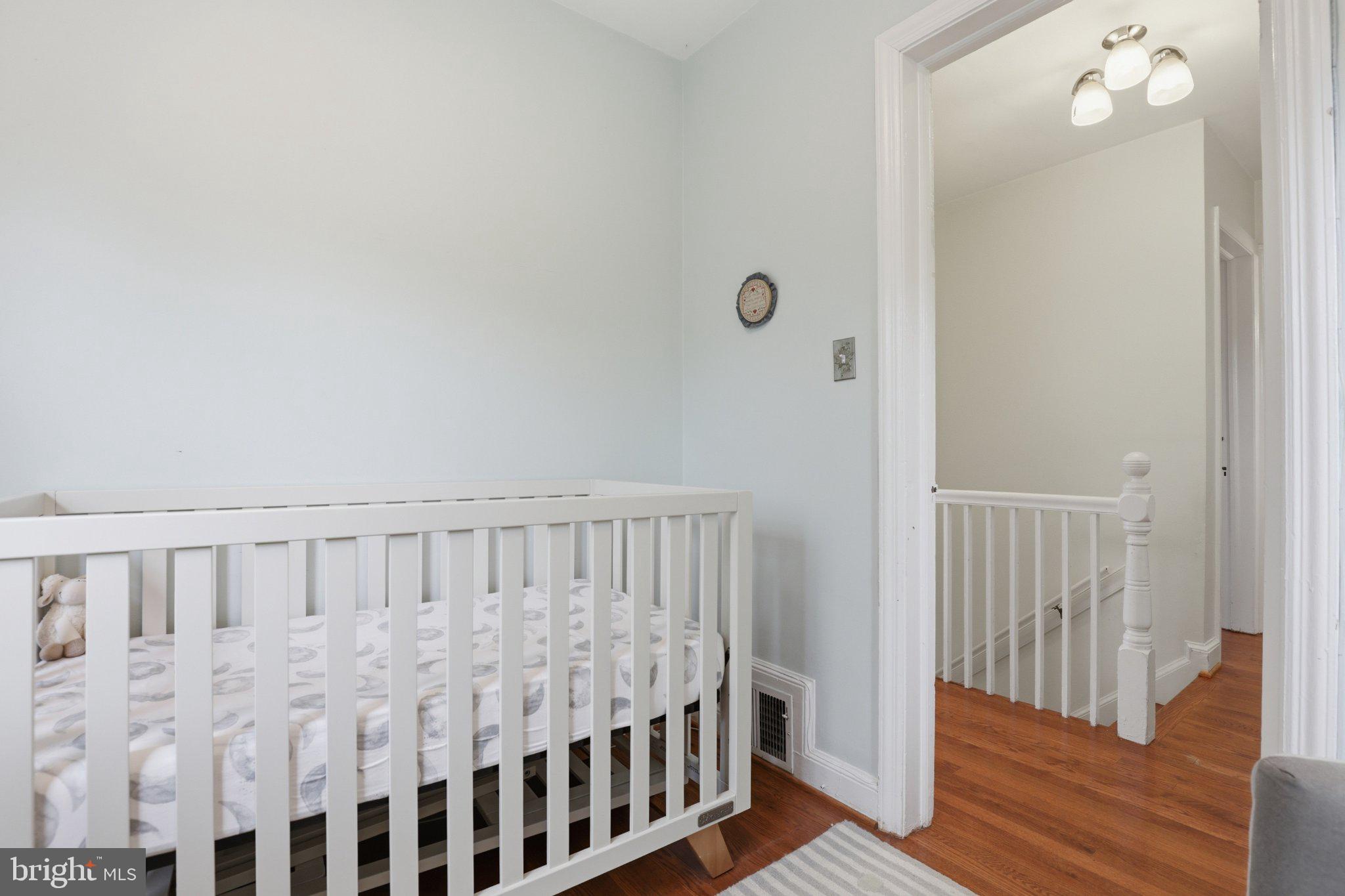 10032 Dallas Avenue Silver Spring, MD 20901 - Photo 20 of 38 Serene nursery with warm wooden floors.