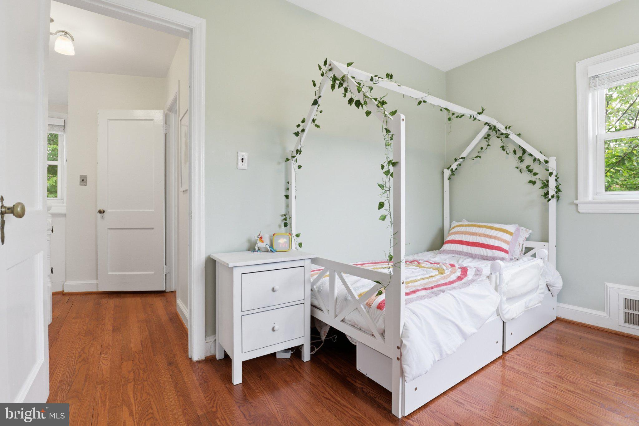10032 Dallas Avenue Silver Spring, MD 20901 - Photo 22 of 38 Charming bedroom with leafy accents.