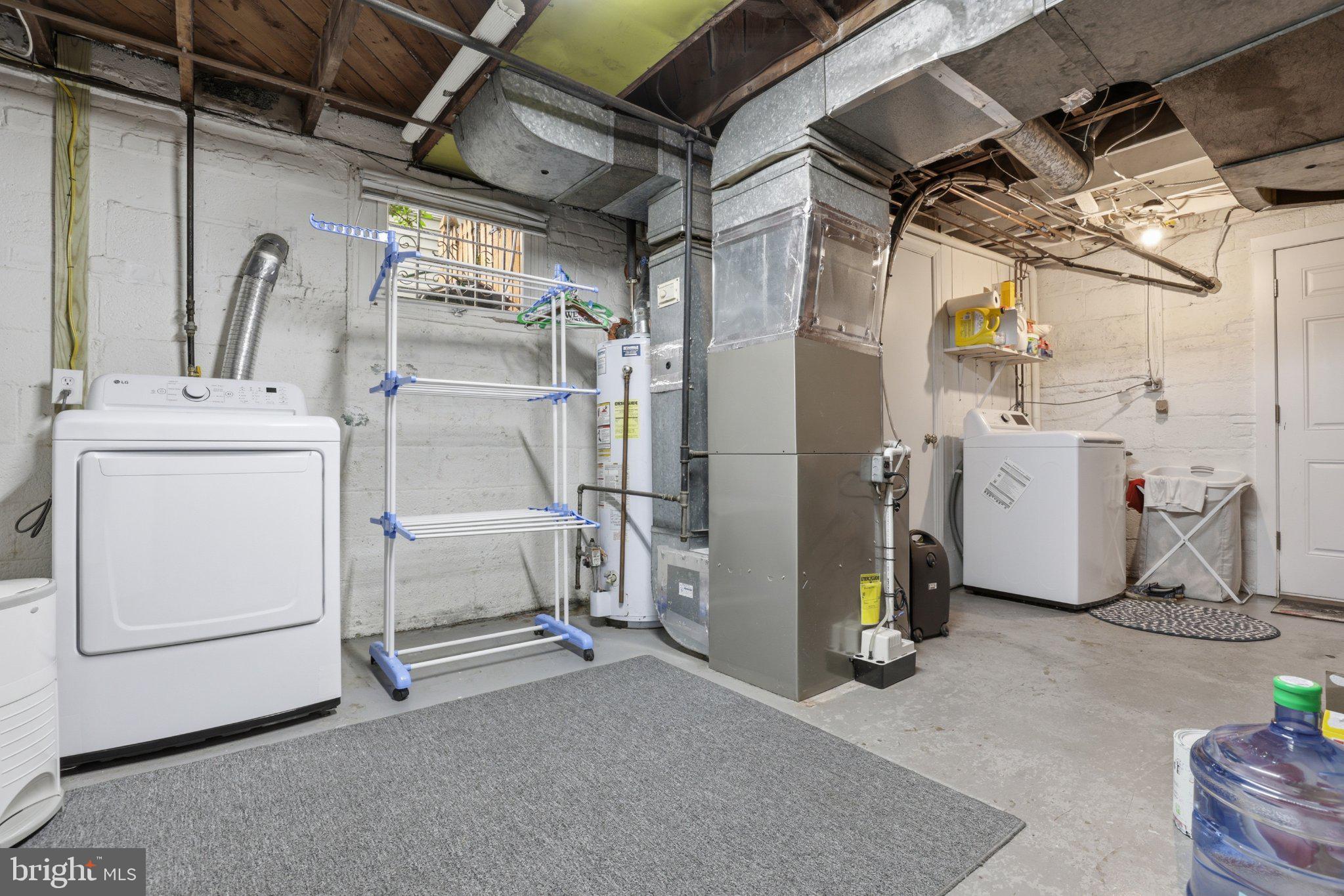 10032 Dallas Avenue Silver Spring, MD 20901 - Photo 27 of 38 Functional basement laundry space.