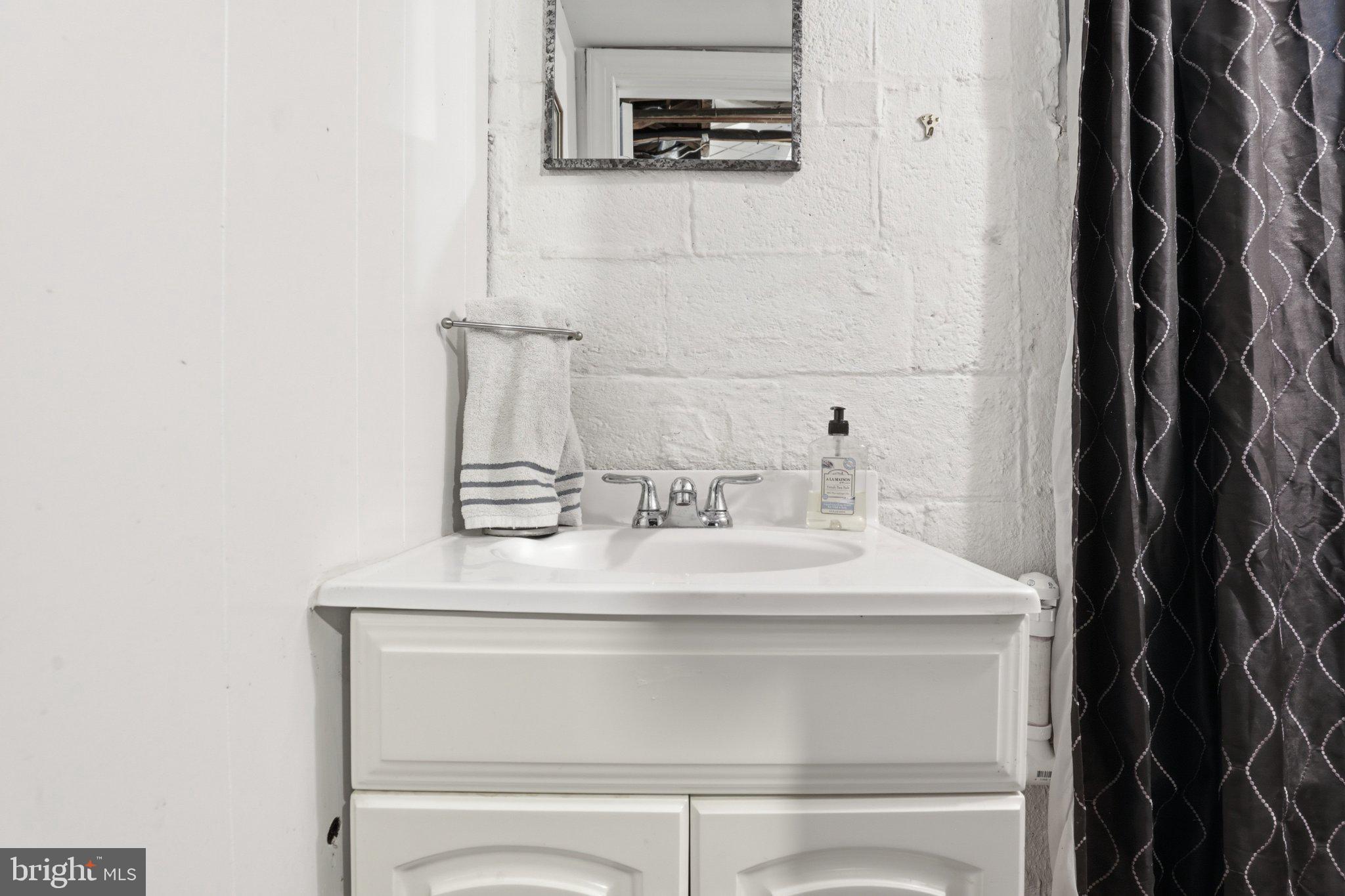 10032 Dallas Avenue Silver Spring, MD 20901 - Photo 28 of 38 Charming bathroom with modern touches.