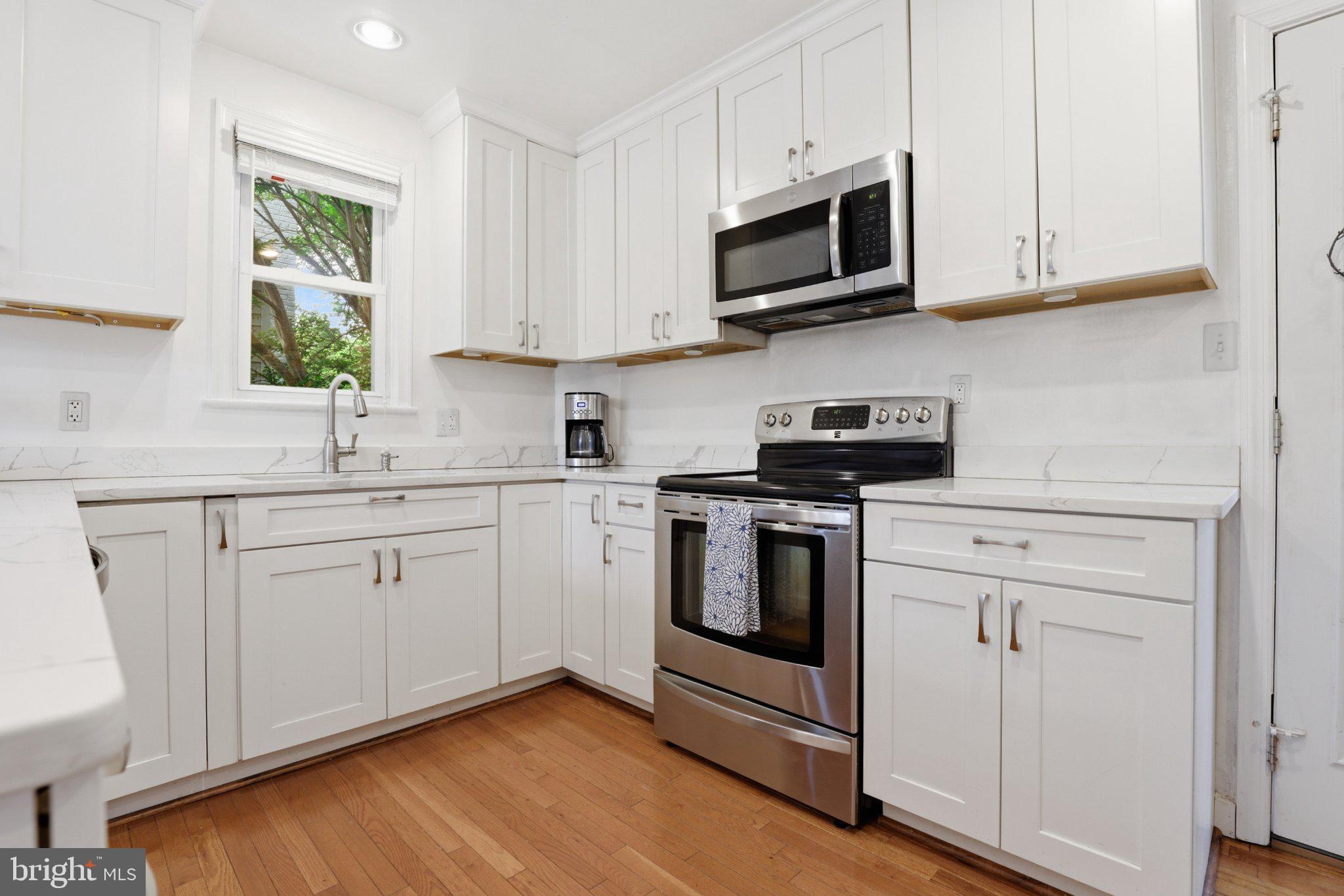 10032 Dallas Avenue Silver Spring, MD 20901 - Photo 4 of 38 Bright and modern kitchen oasis.