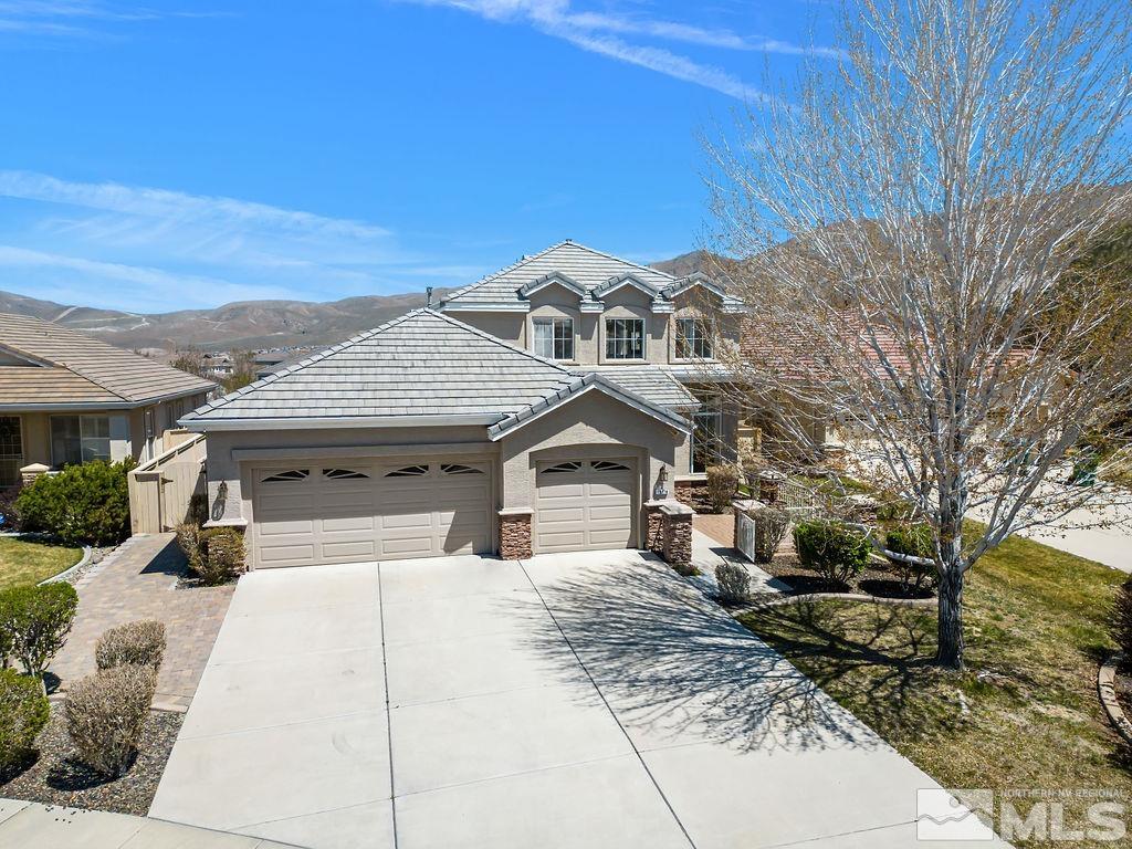 10778 Misty Meadows Drive Reno, NV 89521 - Photo 1 of 40 a house view with a outdoor space