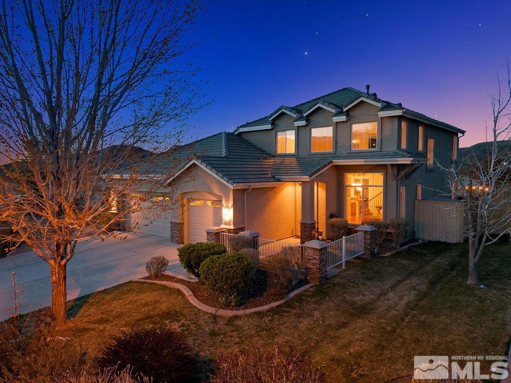 10778 Misty Meadows Drive Reno, NV 89521 - Photo 2 of 40 a view of a house with a yard