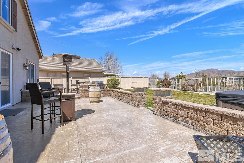 10778 Misty Meadows Drive Reno, NV 89521 - Photo 33 of 40 a view of a terrace with furniture and city view