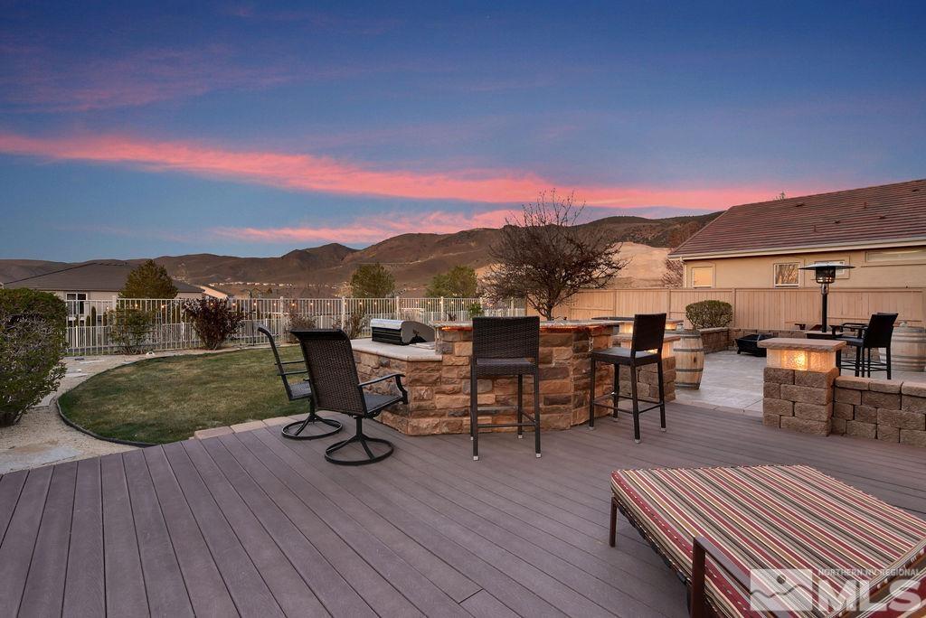 10778 Misty Meadows Drive Reno, NV 89521 - Photo 35 of 40 a view of a terrace with furniture and wooden floor