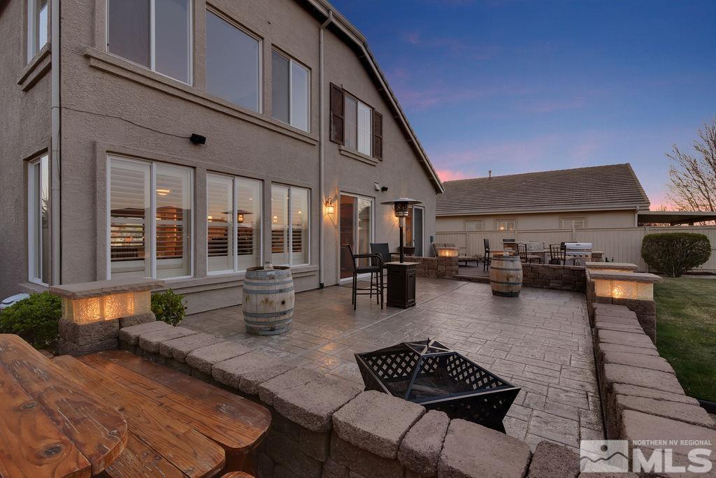 10778 Misty Meadows Drive Reno, NV 89521 - Photo 39 of 40 a view of a patio with swimming pool table and chairs