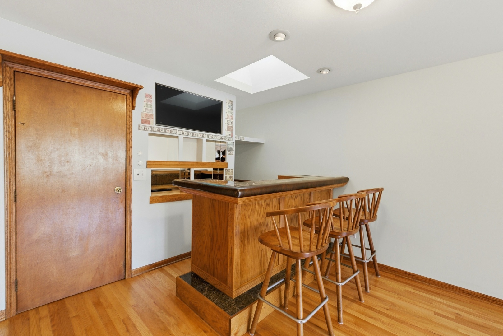 704 Springfield Drive Roselle, IL 60172 - Photo 5 of 28 a view of a dining room with furniture and wooden floor