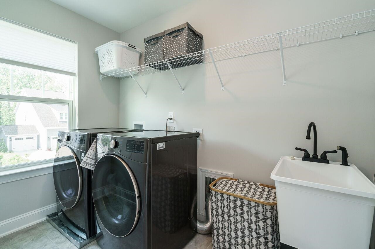 136 Rostova Way Holly Springs, NC 27540 - Photo 29 of 42 Laundry Room