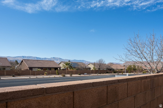 4708 Martin Drive St. George, UT 84790 - Photo 27 of 28 View of asphalt road featuring a mountain view and sidewalks