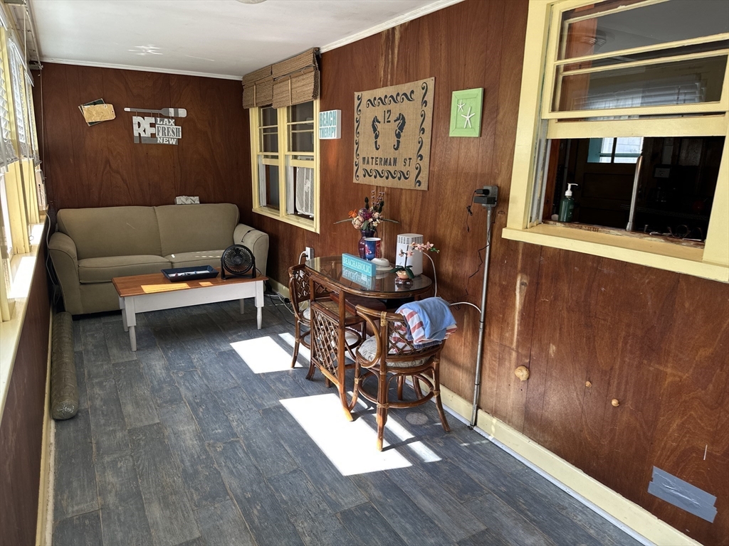 12 Waterman Street, Unit WINTER Mattapoisett, MA 02739 - Photo 16 of 19 a living room with furniture and a wooden floor