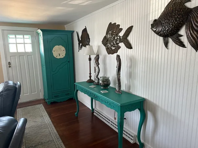 a view of a livingroom with furniture and window