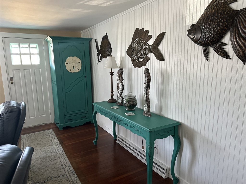 12 Waterman Street, Unit WINTER Mattapoisett, MA 02739 - Photo 3 of 19 a view of a livingroom with furniture and window