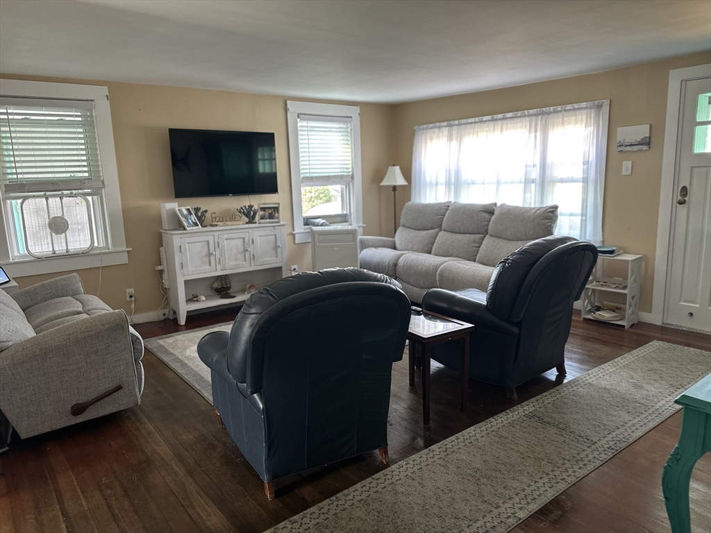 12 Waterman Street, Unit WINTER Mattapoisett, MA 02739 - Photo 5 of 19 a living room with furniture and a flat screen tv