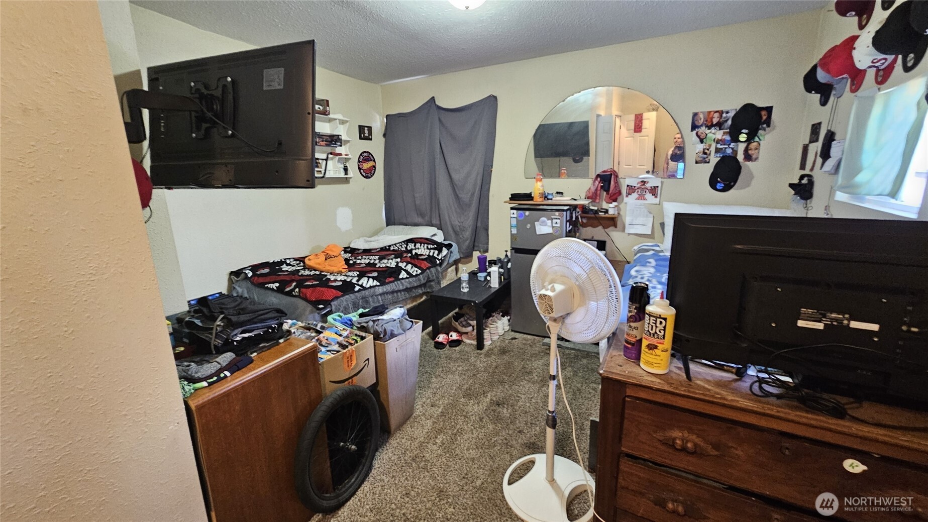 947 19th Avenue Longview, WA 98632 - Photo 7 of 12 a bathroom with a sink mirror and vanity