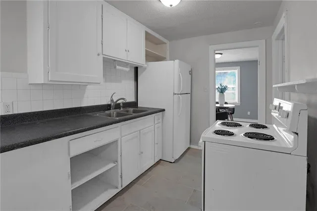 $135,000 | 7406 Tracy Avenue, Kansas City, MO 64131