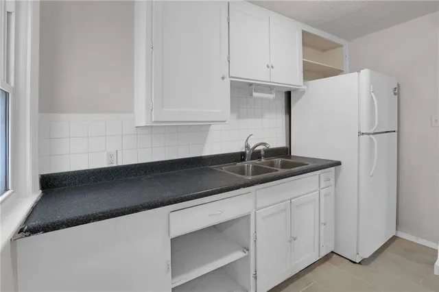 $135,000 | 7406 Tracy Avenue, Kansas City, MO 64131