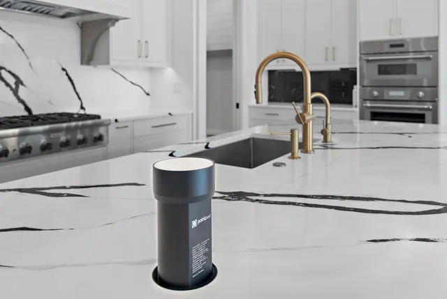 a bathroom with double vanity sinks and a mirror